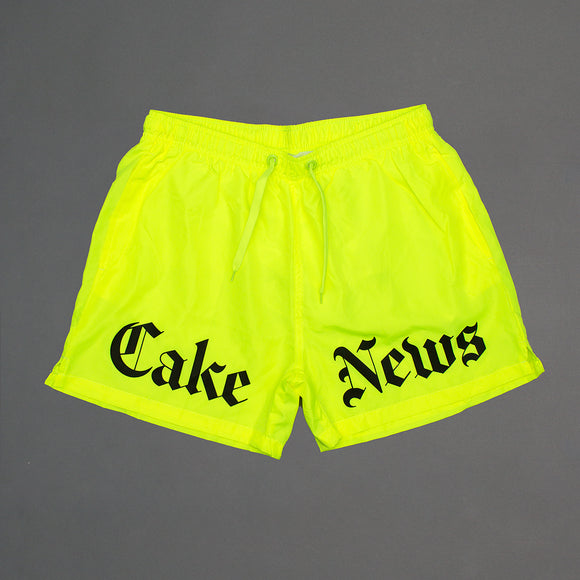 Cake News Swim Shorts