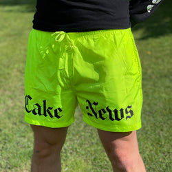 Cake News Swim Shorts